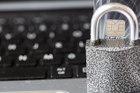 Lock and Credit card on Computer Keyboard