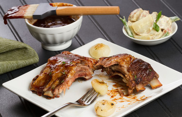 Barbecue Rib Snack with Cipollini Onions and Potato Salad