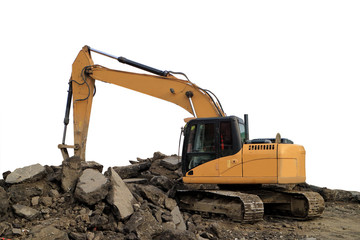 yellow excavator is digging a trench.