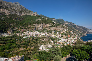 Obraz premium Panorama of Positano with houses climbing up the hill, Campania, Italy