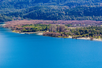 Panoramic view of the beautiful park and lake in Lago Puelo - Argentina in the autumn