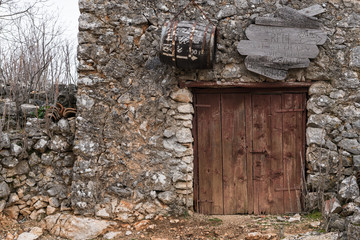 Very old weathered brown door made of wood