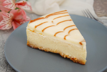 Cheese Cake with Caramel Sauce Isolated Caramel Sauce over Brown Paper with Spoon Sweet Sugar Dessert