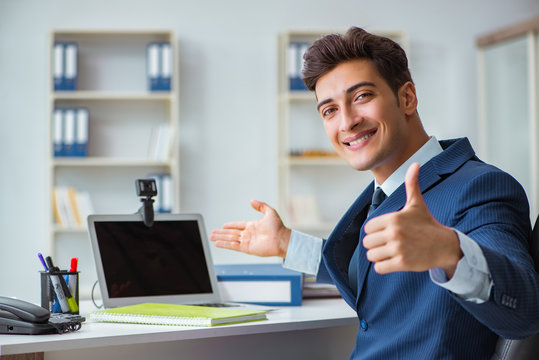 Young Help Desk Operator Working In Office