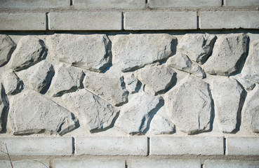 Gray stone wall background. Texture of painted brick.