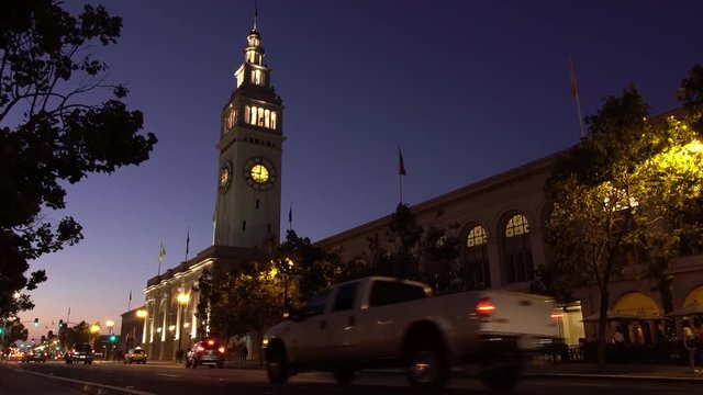 Cars, people and buildings in a normal night in Silicon Valley at Embarcadero Station in San Francisco.