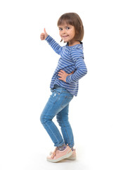 A little kid pointing with her thumb up and showing a copy makes spaces for posting your information against the white background.