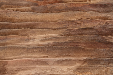 Abstract colorful patterns sandstone gorge Siq,Rose City, Petra, Jordan. Red canyon walls create many abstracts backgrounds