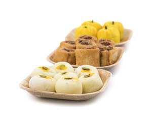 Indian Sweet Peda with Bhakarwadi or Apple Shaped peda Also Know as bakarwadi, bakarvadi, pedha or peday is a prepared in thick, semi-soft pieces. the main ingredients are khoya, sugar