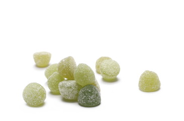 Green jelly, gummy sugar candies isolated on white background 