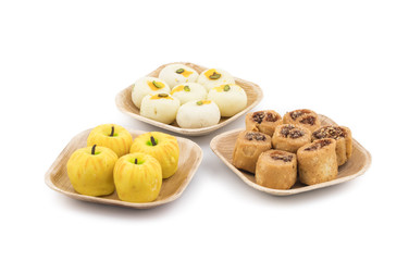 Indian Sweet Peda with Bhakarwadi or Apple Shaped peda Also Know as bakarwadi, bakarvadi, pedha or peday is a prepared in thick, semi-soft pieces. the main ingredients are khoya, sugar