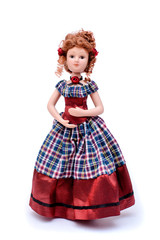 Porcelain doll in vintage dress