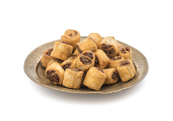 Indian Fried Bhakarwadi Tea Time Snack also known as bakarwadi, bakarvadi, bakar vadi, bakar wadi or spring roll is a traditional spicy Maharashtra and Gujarat Snack isolated on White Background