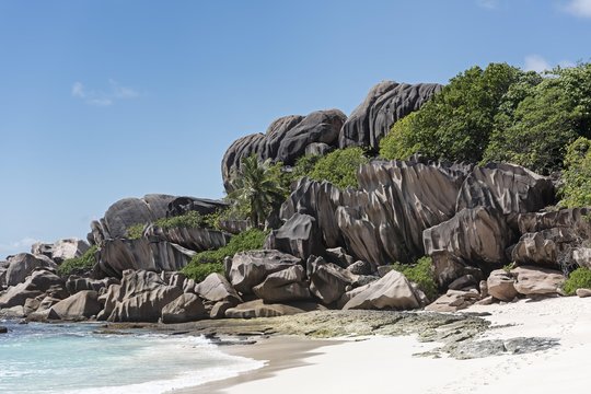 Grand Anse sandy beach with black granite rocks, La Digue, Seychelles, Africa