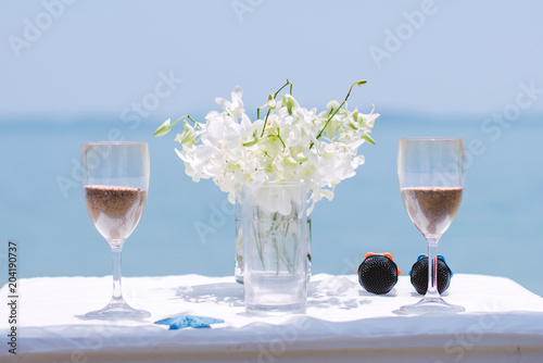 Wedding Sand Ceremony On The Table By The Sea Stock Photo And