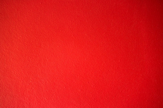Concrete red wall texture and background.