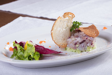 Холодная закуска из рыбы с лемоном. Cold appetizer from fish with a lemon 