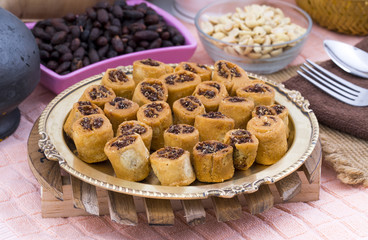 Indian Fried Bhakarwadi Tea Time Snack also known as bakarwadi, bakarvadi, bakar vadi, bakar wadi or spring roll is a traditional spicy Maharashtra and Gujarat Snack