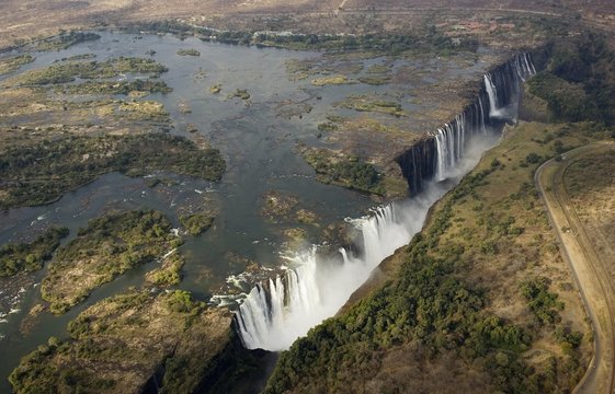 Aerial view of the Zambezi River and the Victoria Falls, in the foreground the Main Falls in Zimbabwe, behind the Rainbow Falls and the Eastern Cataract in Zambia, World Heritage Site, Victoria Falls, Zimbabwe, Zambia, Africa