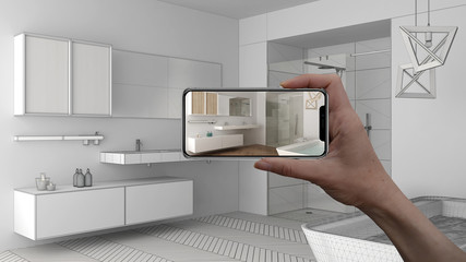 Hand holding smart phone, AR application, simulate furniture and interior design products in real...