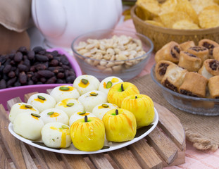 Indian Mix Sweet Food Apple Shaped Peda With White Peda Also Know as pedha, pera or peday is a prepared in thick, semi-soft pieces. the main ingredients are khoya, sugar