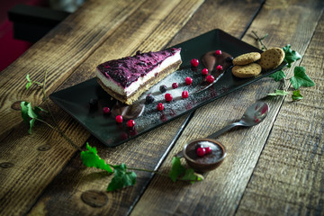 Homemade cheesecake with fresh berries and chocolate