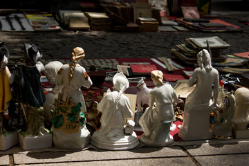 ceramic girl firgues on a street market