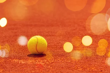 Foto op Plexiglas Tennis ball on clay court © Bits and Splits