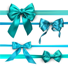 Turquoise and blue satin bows isolated on white.