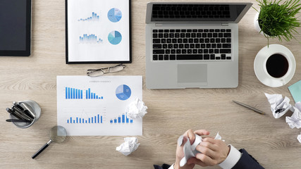 Crisis at work, businessman trying to create new successful business strategy