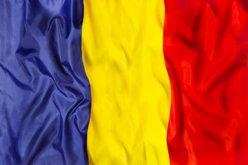 Romania national flag with waving fabric 