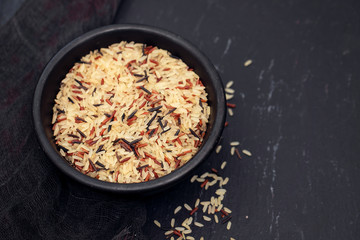 mix rice in small black bowl