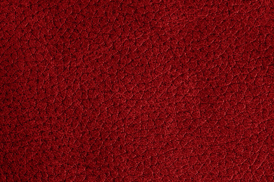 Red  elegance leather texture for background with visible details 