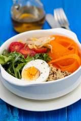 vegetables with boiled egg in white bowl