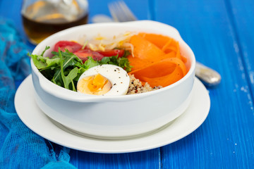 vegetables with boiled egg in white bowl