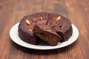 traditional honey cake of Madeira, Portugal on white plate