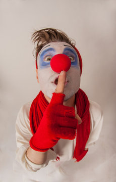emotional guy mime funny posing on camera. Human emotions in the image of a clown