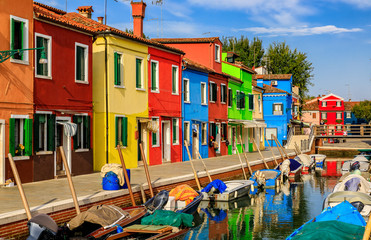 Picturesque canal and colorful houses in Burano island near Venice Italy