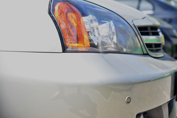 Close-up headlights of car, art soft focus