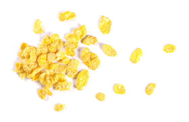 Crunchy corn flakes, cereal, muesli pile isolated on white background, top view