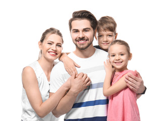 Portrait of couple with children on white background. Happy family