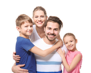 Portrait of couple with children on white background. Happy family