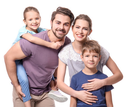 Portrait Of Couple With Children On White Background. Happy Family
