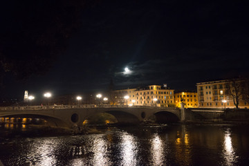 Fototapeta na wymiar Verona - Pietra bridge on Adige river at night-Italy
