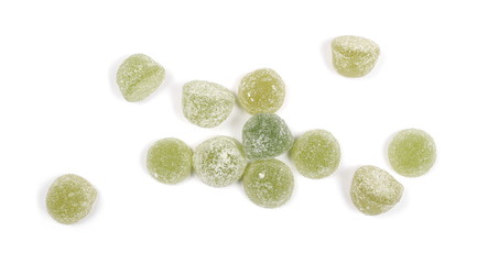 Green jelly, gummy sugar candies isolated on white background, top view
