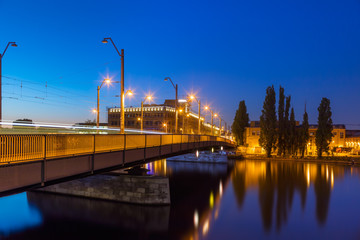 Fototapeta na wymiar Berlin Schoeneweide - Treskow Bridge over Spree River / Summer Night