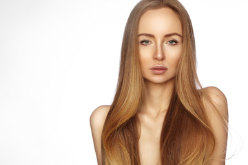 Fototapeta premium Beautiful yong woman with long straight shiny hair. Sexy fashion model with smooth gloss hairstyle. Keratin treatment