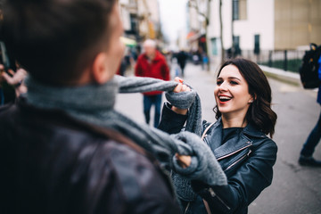 Fashion engagement shooting, photo session for beautiful couple, walk of a couple in love around the city and park.