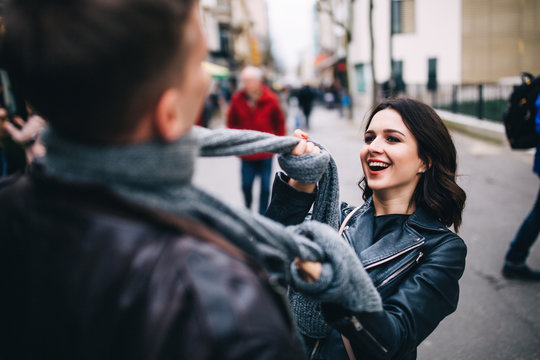 Fashion engagement shooting, photo session for beautiful couple, walk of a couple in love around the city and park.