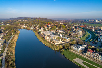 Fototapeta na wymiar Krakow, Poland. Slawator district with Norbertine nunnery, church, Vistula and Rudawa rivers and far view of Kosciuszko Mound. Aerial photo